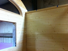 TURN ON IMAGES to see interior wall of a tiny house being built